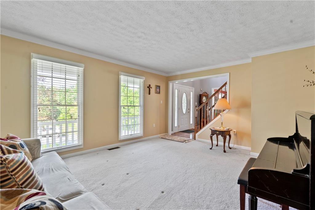 104 Field Club Circle McKees Rocks, PA 15136 - Photo 9 of 25 a view of a livingroom with furniture and windows