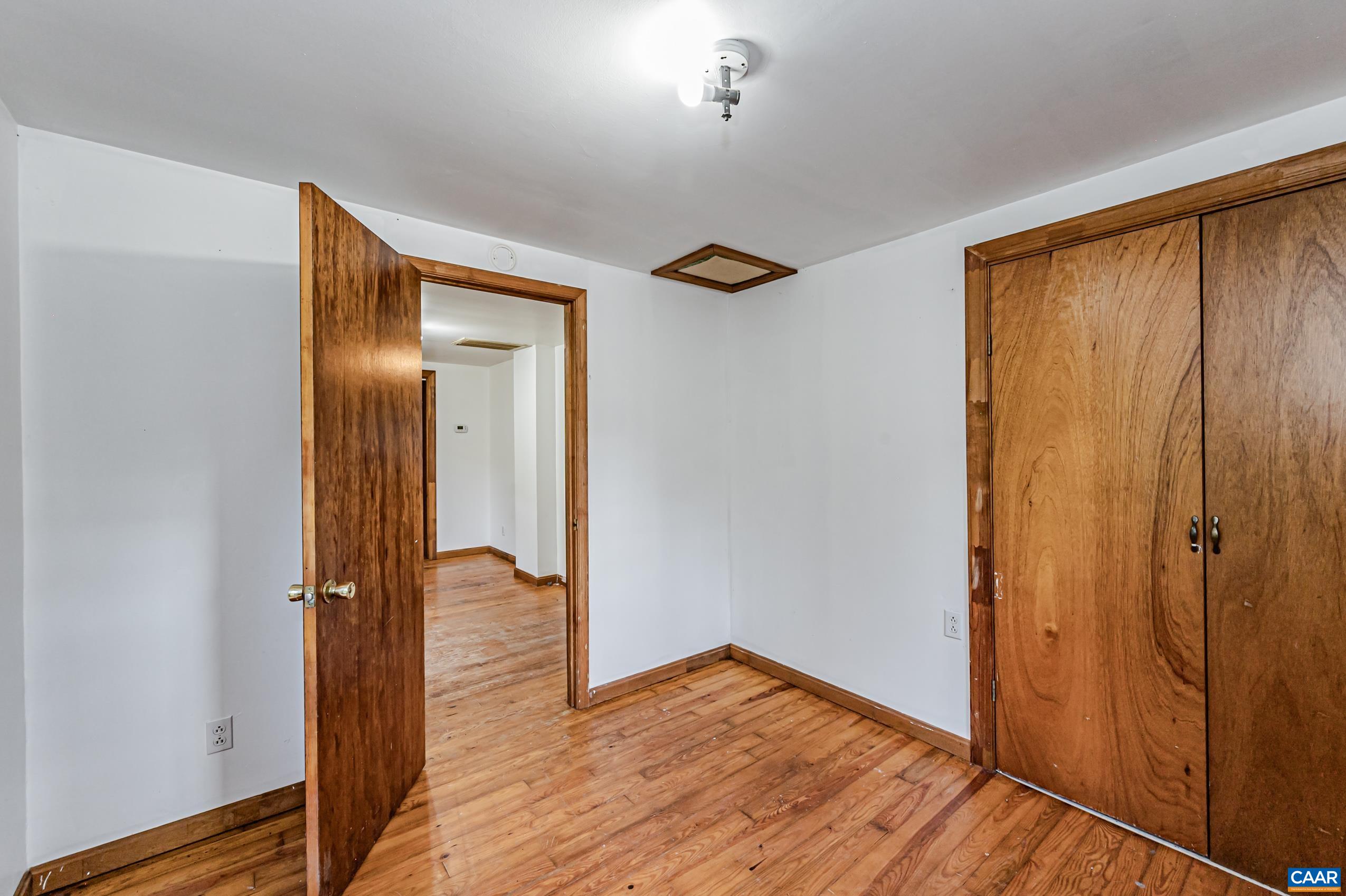 431 Graves Mill Road Madison, VA 22727 - Photo 16 of 26 a view of hallway with wooden floor