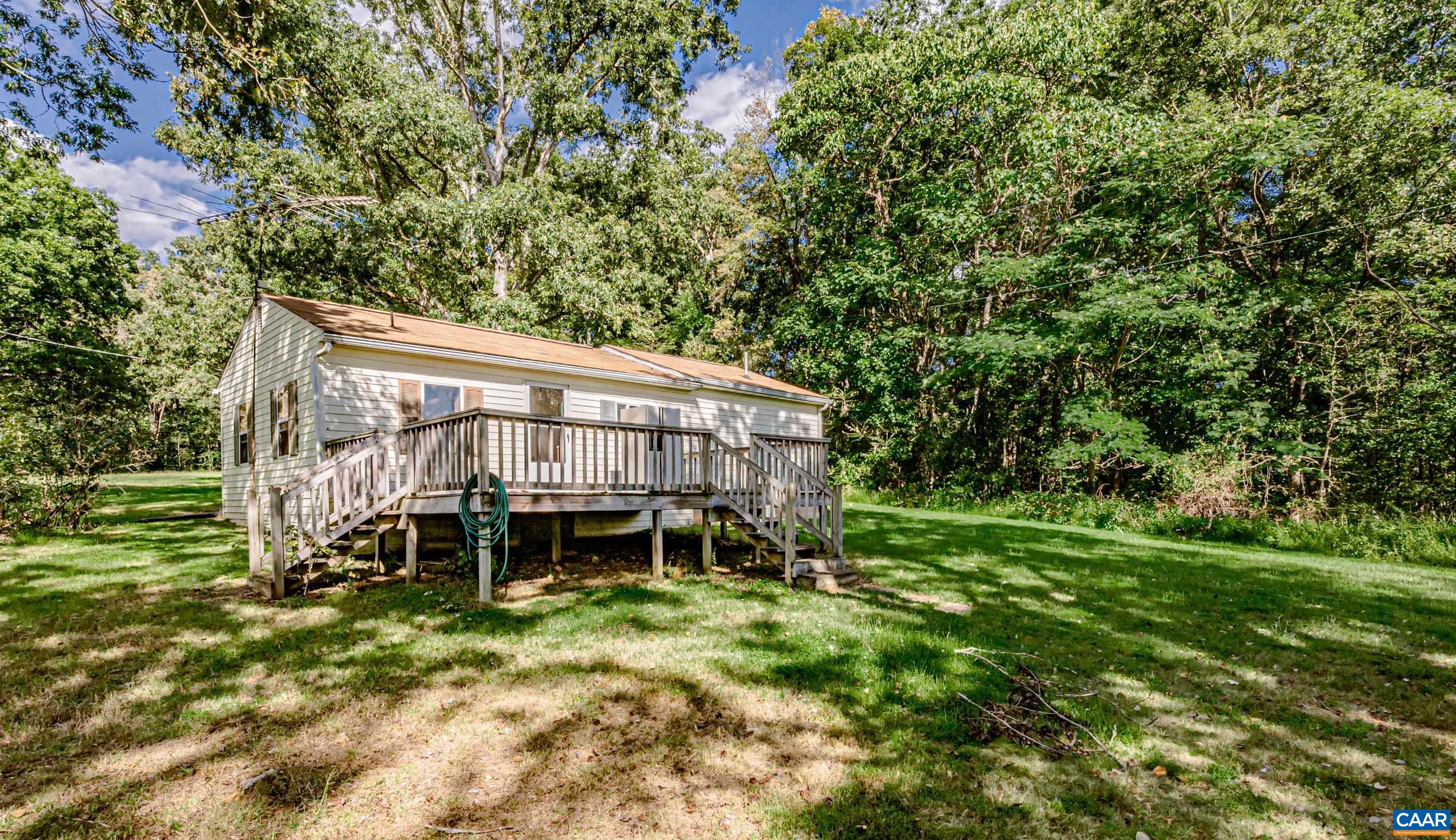 431 Graves Mill Road Madison, VA 22727 - Photo 22 of 26 a view of a house with a backyard
