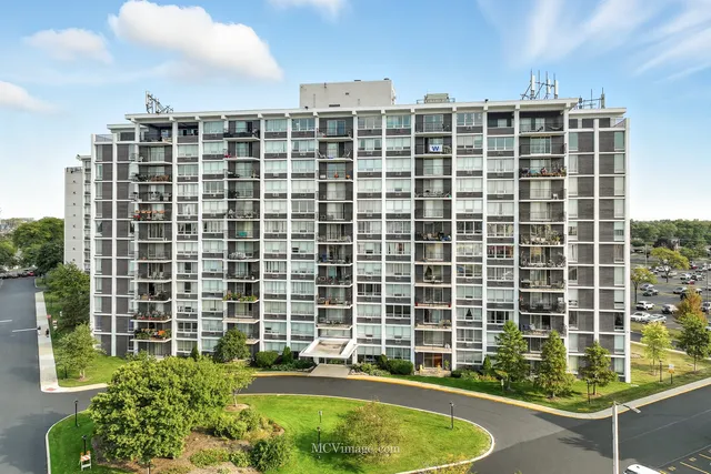 a view of a building with a swimming pool