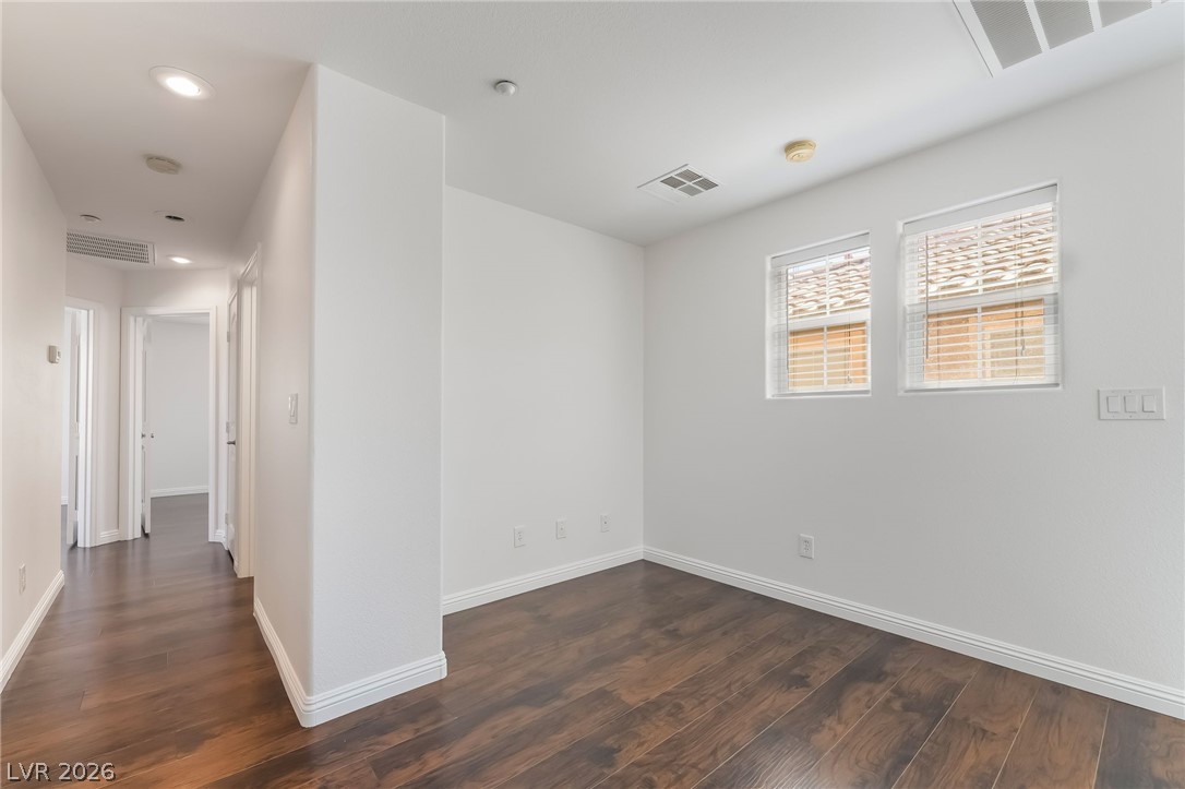 3175 Via Seranova Henderson, NV 89044 - Photo 19 of 45 This versatile interior space features rich hardwood flooring and ample natural light.