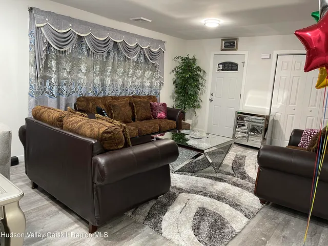 a living room with furniture and a couch