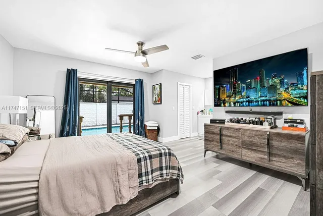 a bathroom with a toilet and shower