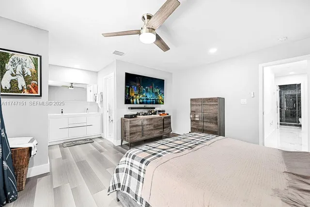 a view of cabinets with wooden floor