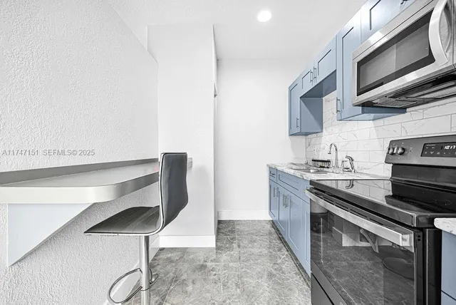 a view of a backyard with a patio