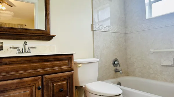 a bathroom with a sink and a bathtub