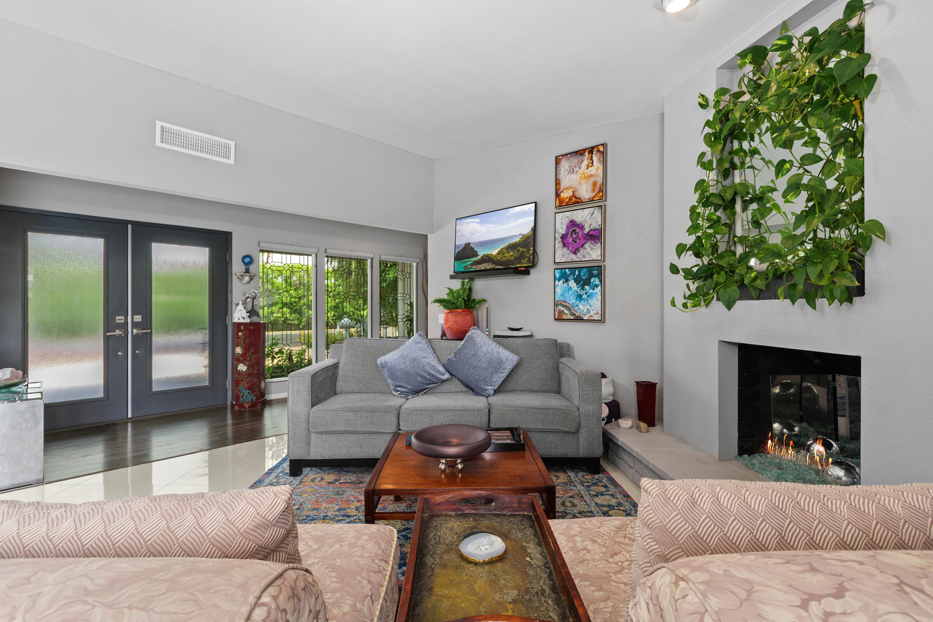 71305 Kempton Avenue Rancho Mirage, CA 92270 - Photo 12 of 58 a living room with furniture and a large window