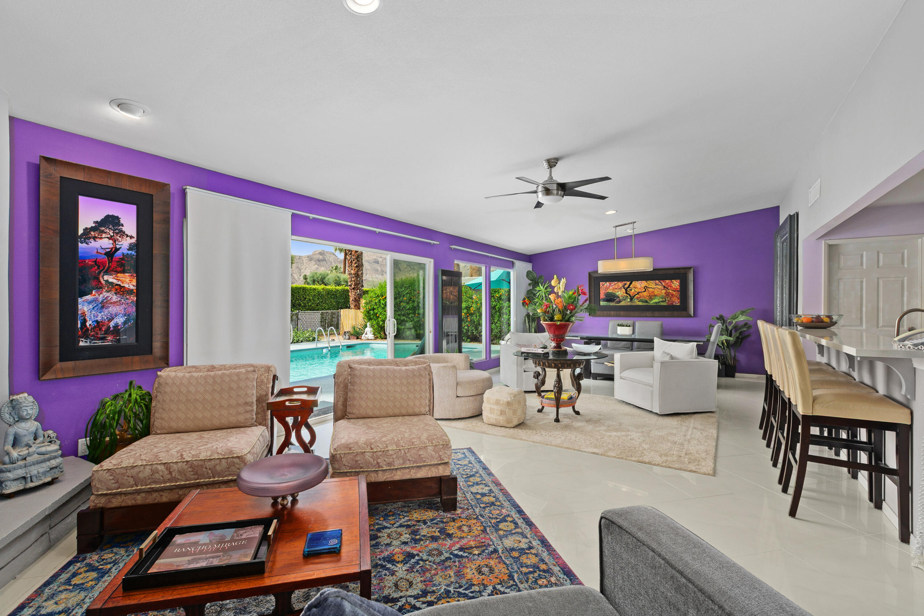 71305 Kempton Avenue Rancho Mirage, CA 92270 - Photo 13 of 58 a living room with furniture and a large window