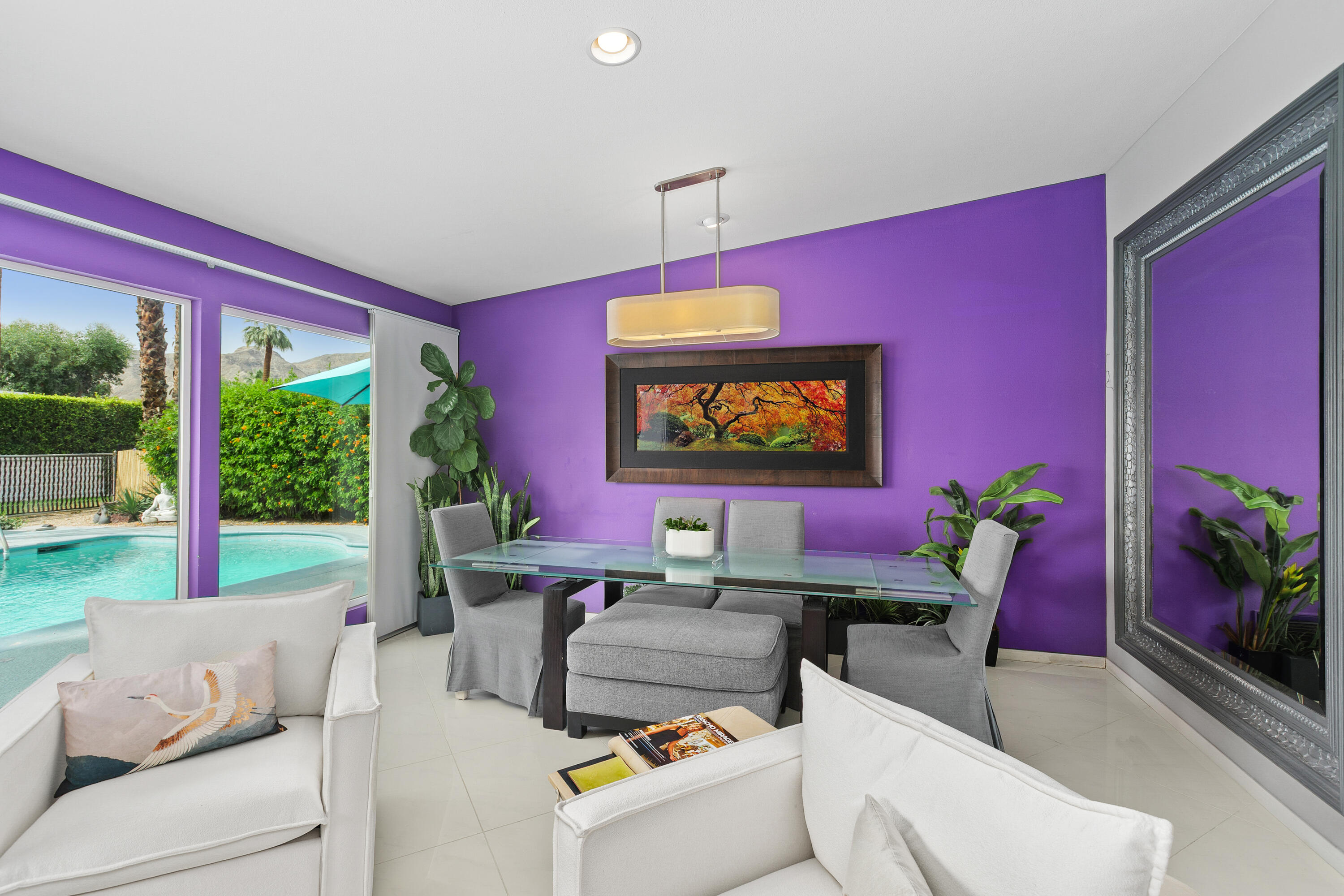 71305 Kempton Avenue Rancho Mirage, CA 92270 - Photo 15 of 58 a living room with furniture and a potted plant