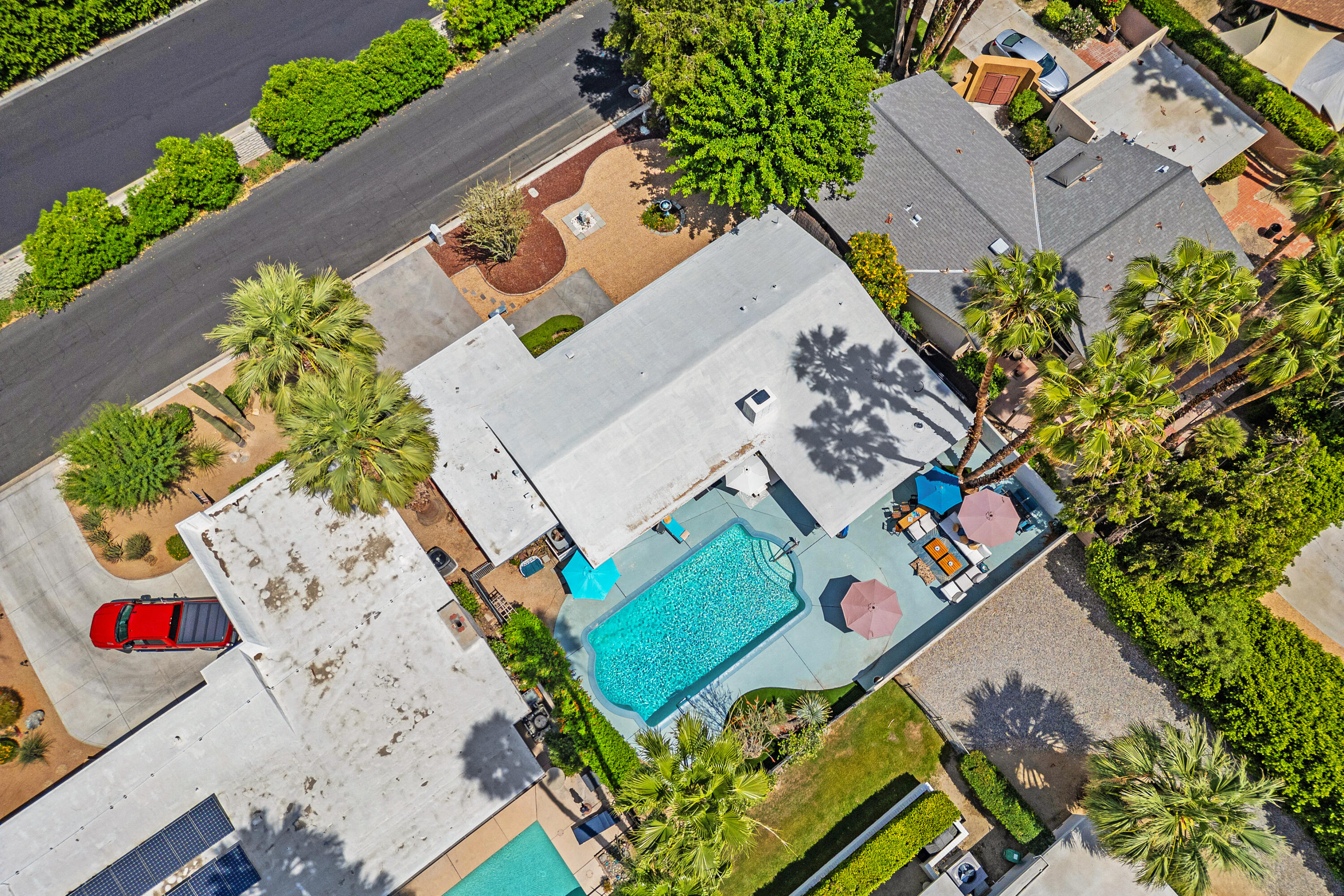 71305 Kempton Avenue Rancho Mirage, CA 92270 - Photo 3 of 58 an aerial view of a house a yard and street