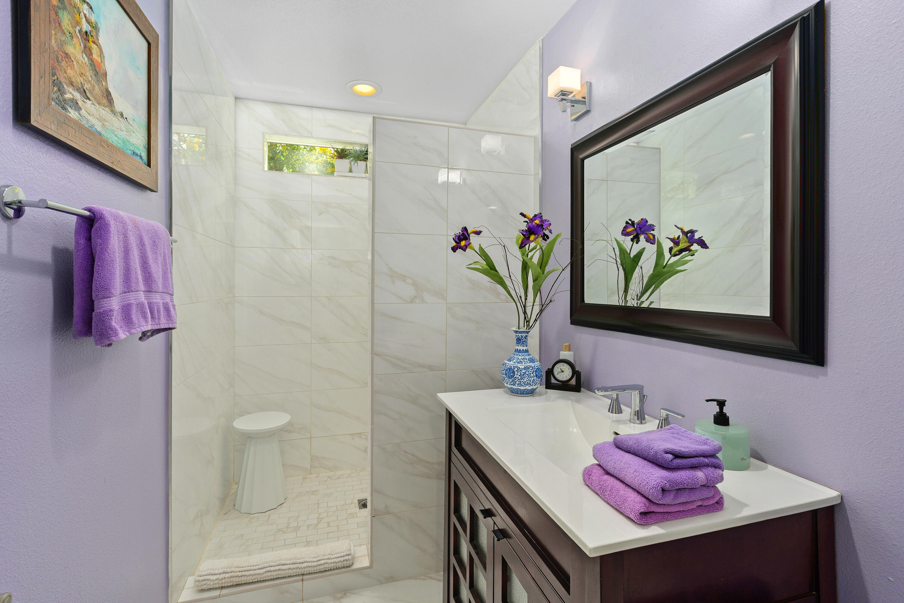 71305 Kempton Avenue Rancho Mirage, CA 92270 - Photo 38 of 58 a bathroom with a sink mirror and vanity
