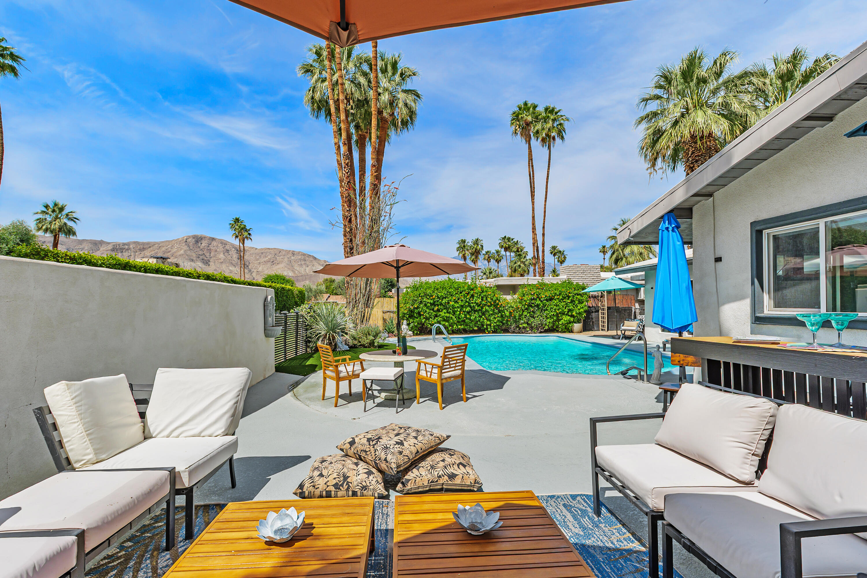 71305 Kempton Avenue Rancho Mirage, CA 92270 - Photo 42 of 58 a view of a patio with furniture