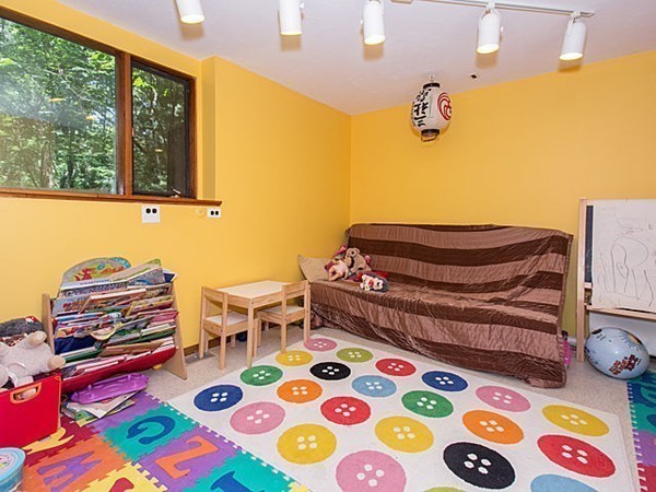 138 Weston Road Lincoln, MA 01773 - Photo 14 of 22 a room with furniture and a window