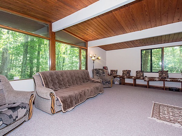 138 Weston Road Lincoln, MA 01773 - Photo 15 of 22 a living room with furniture and a large window