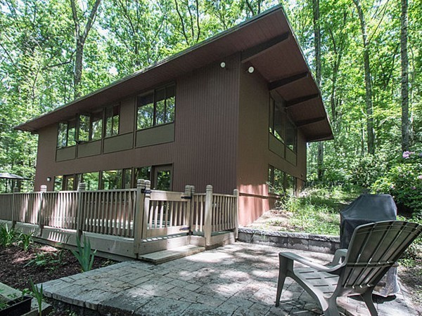 138 Weston Road Lincoln, MA 01773 - Photo 5 of 22 a view of a chair and table in the patio
