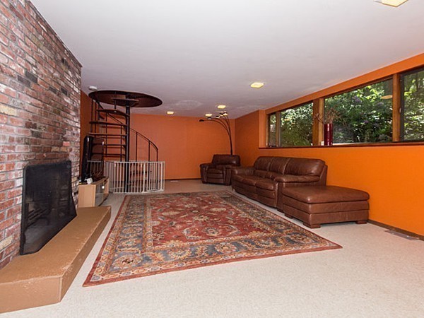 138 Weston Road Lincoln, MA 01773 - Photo 7 of 22 a living room with furniture and a fireplace