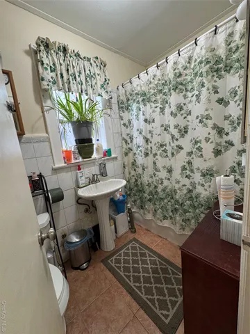 a living room with a couch and a table