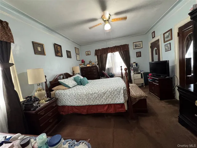 a living room with furniture fireplace and flat screen tv