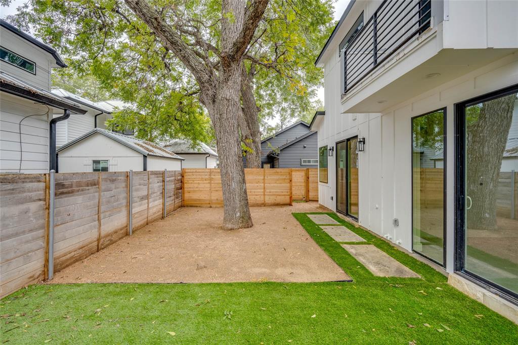 1406 East 2nd Street, Unit 2 Austin, TX 78702 - Photo 18 of 20 a view of backyard with large tree