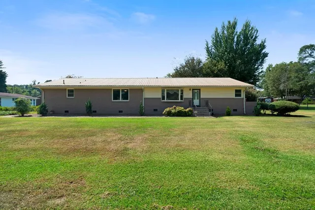 a front view of house with yard