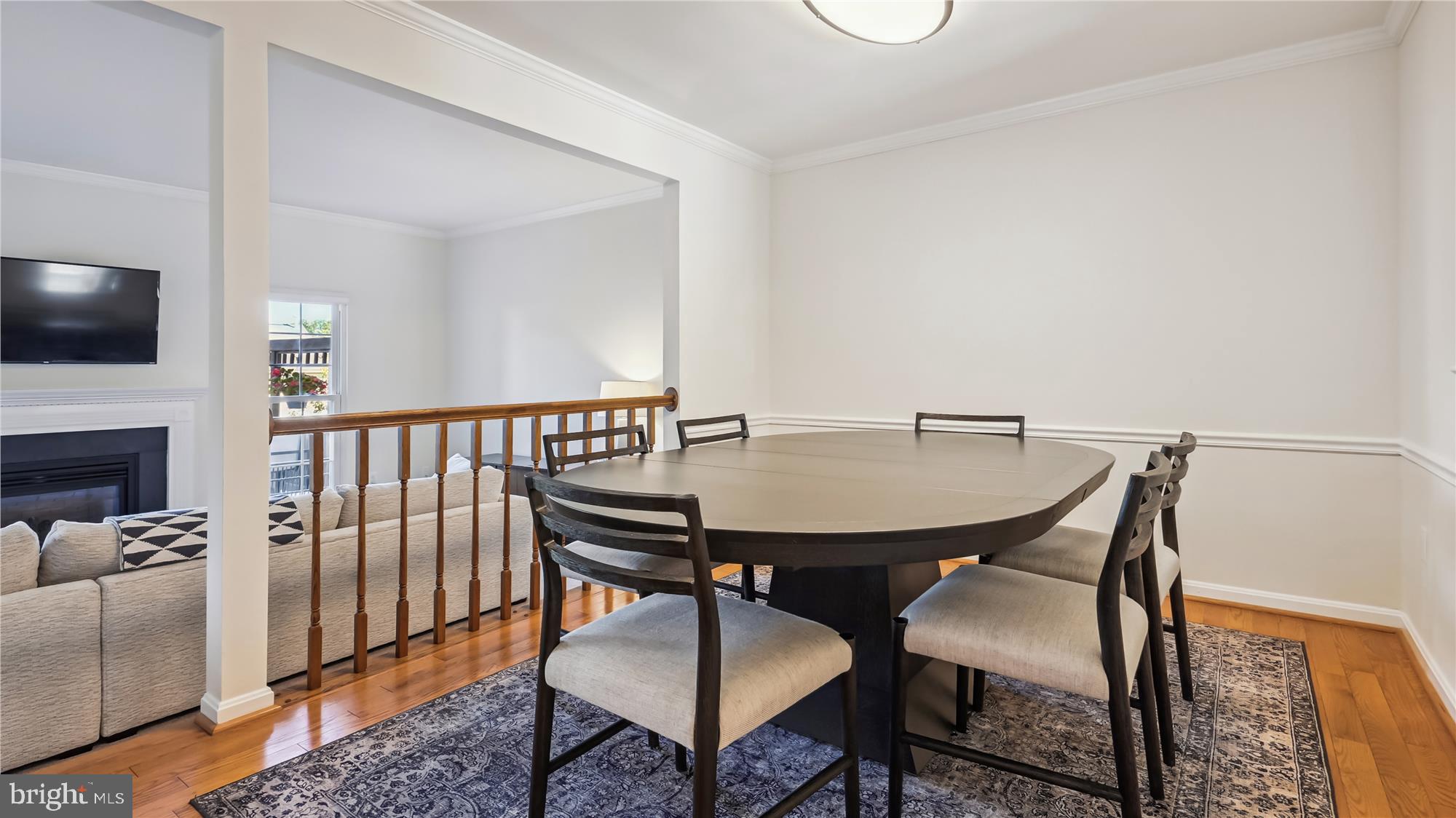43484 Blacksmith Square Ashburn, VA 20147 - Photo 7 of 53 Dining Room Wood Floor chair rail