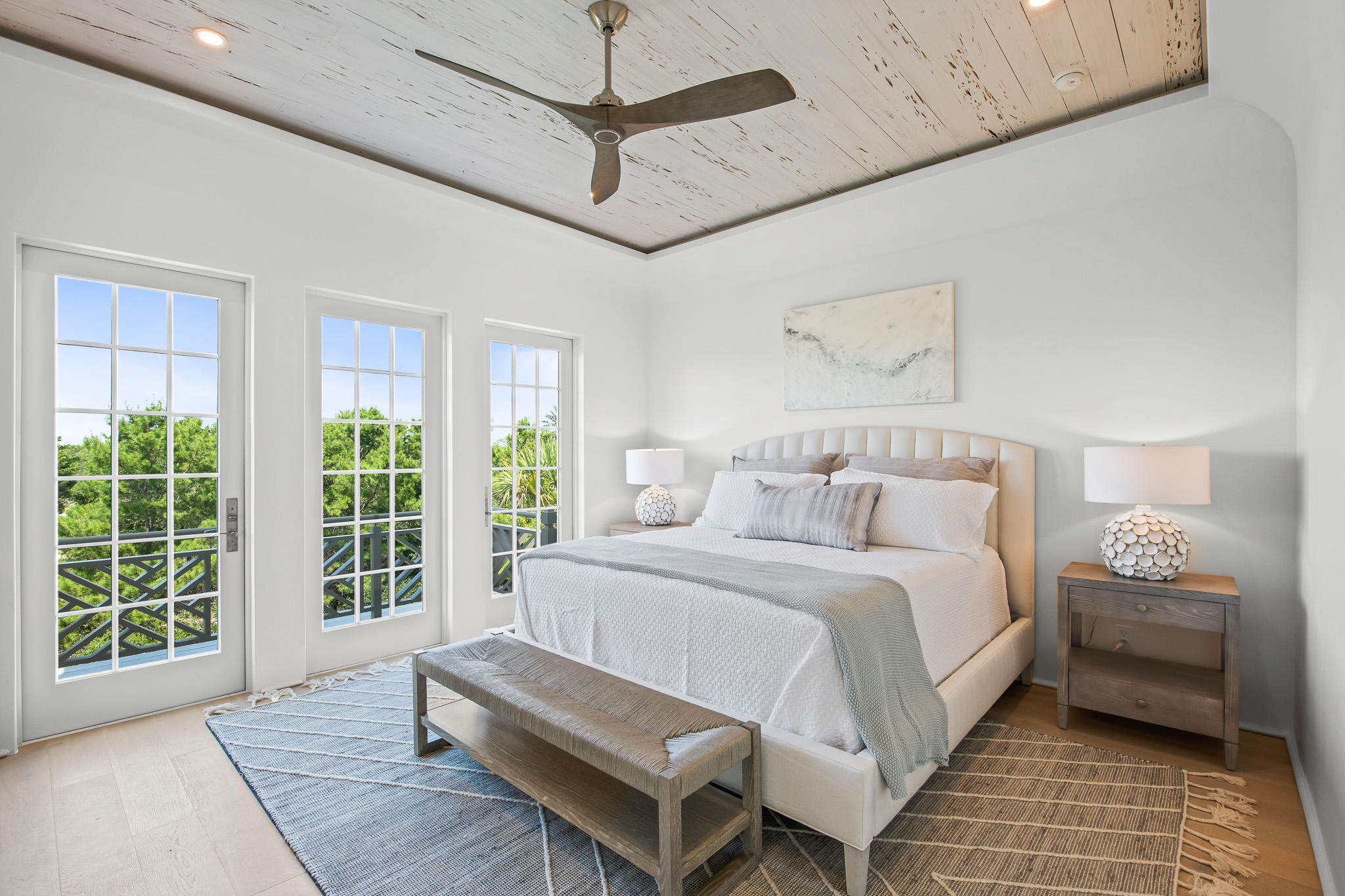 16 Kings Castle Ct Inlet Beach Inlet Beach, FL 32461 - Photo 20 of 33 a spacious bedroom with a bed and a couch