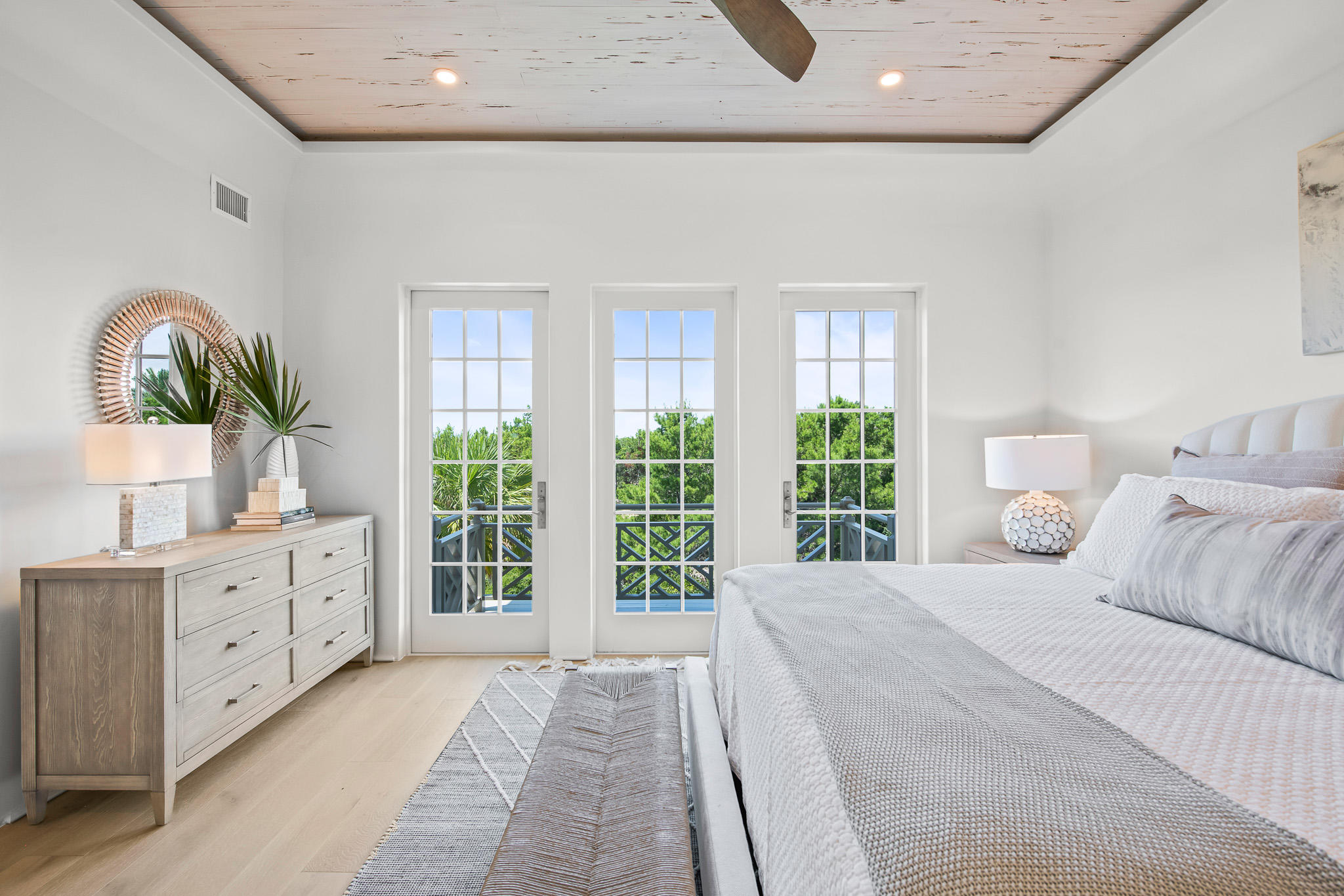 16 Kings Castle Ct Inlet Beach Inlet Beach, FL 32461 - Photo 21 of 33 a bedroom with a large bed and windows