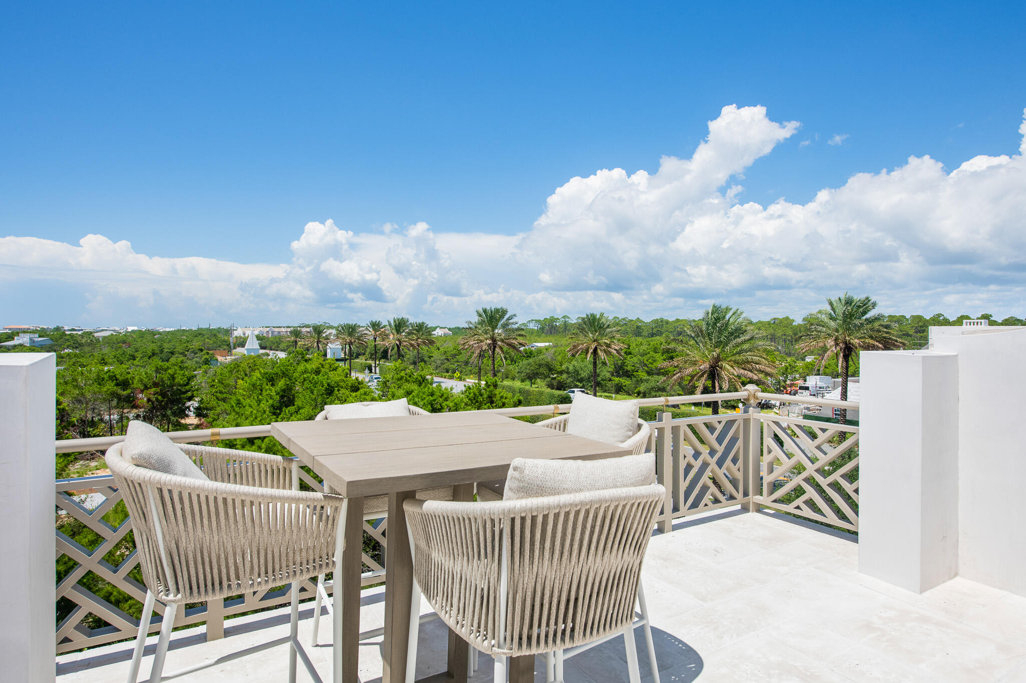 16 Kings Castle Ct Inlet Beach Inlet Beach, FL 32461 - Photo 28 of 33 a view of a patio with a table chairs and a table