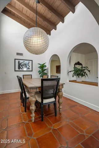 a view of a dining room with furniture