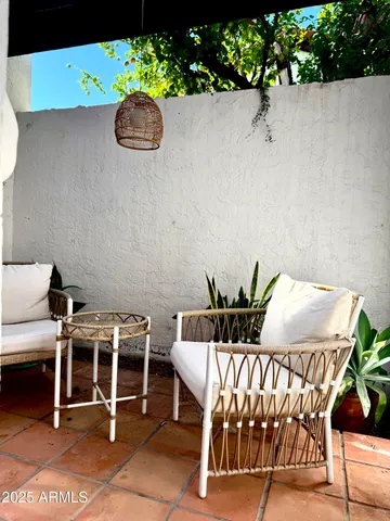 a kitchen with stainless steel appliances granite countertop a sink and a window