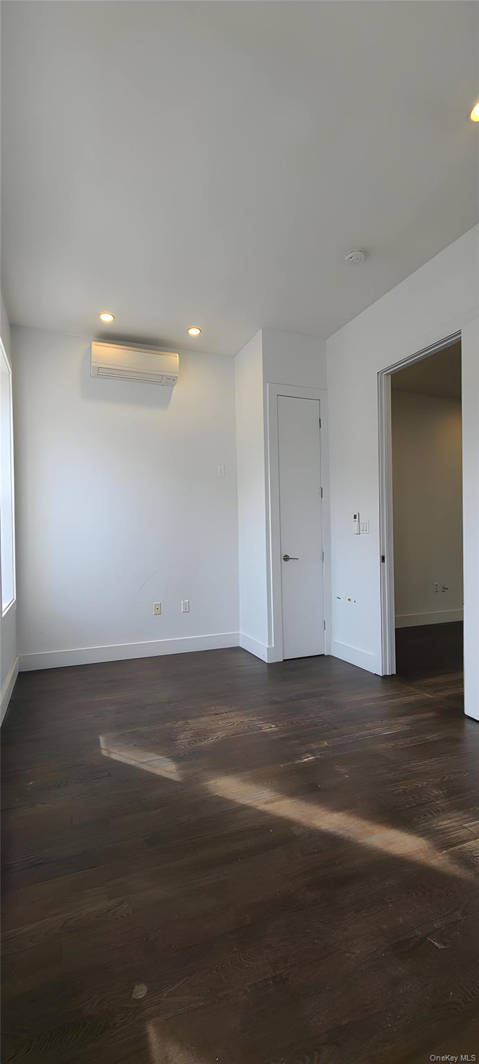 548 Howard Avenue, Unit 2L Brooklyn, NY 11233 - Photo 5 of 7 a view of a room with an empty space