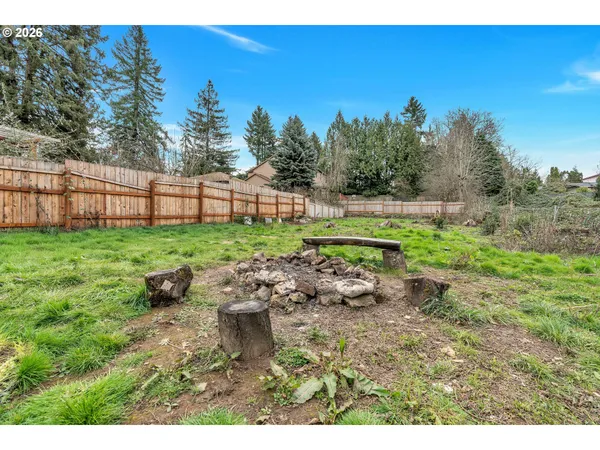 a backyard of a house with lots of green space