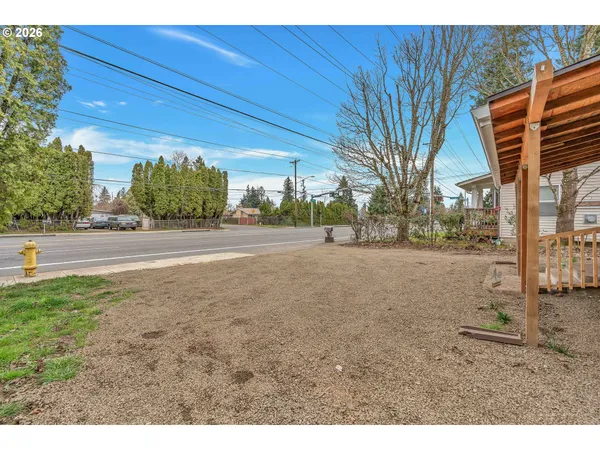 a view of road and trees