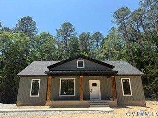 14502 Gatewood Road Dewitt, VA 23840 - Photo 5 of 32 a front view of a house with a yard