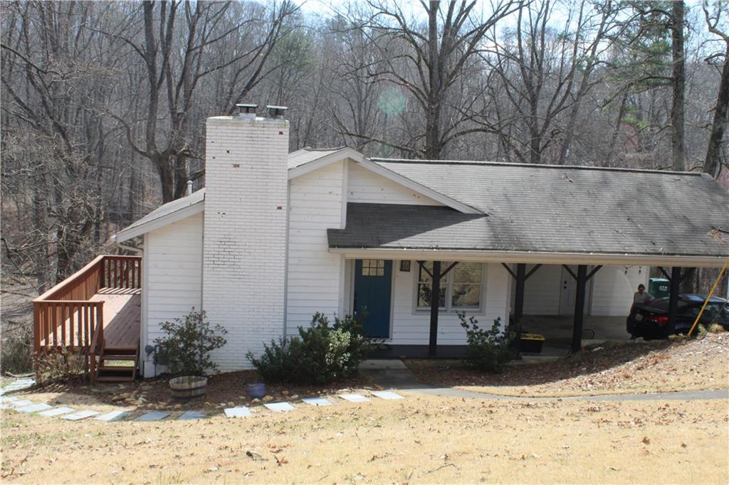 40 Chestatee Springs Road Dahlonega, GA 30533 - Photo 1 of 43 a view of a house with a yard covered in snow