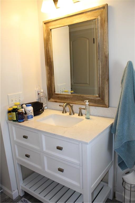 40 Chestatee Springs Road Dahlonega, GA 30533 - Photo 11 of 43 a bathroom with a sink and a mirror