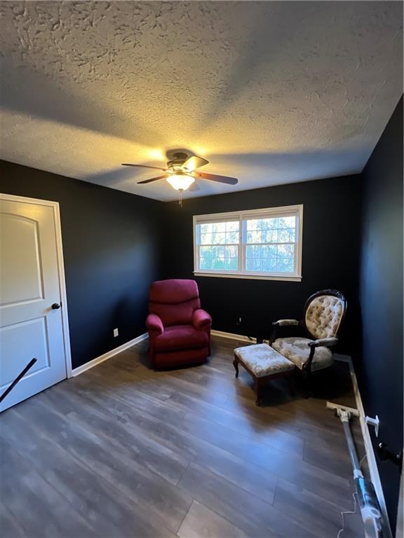 40 Chestatee Springs Road Dahlonega, GA 30533 - Photo 11 of 42 a living room with furniture and a flat screen tv