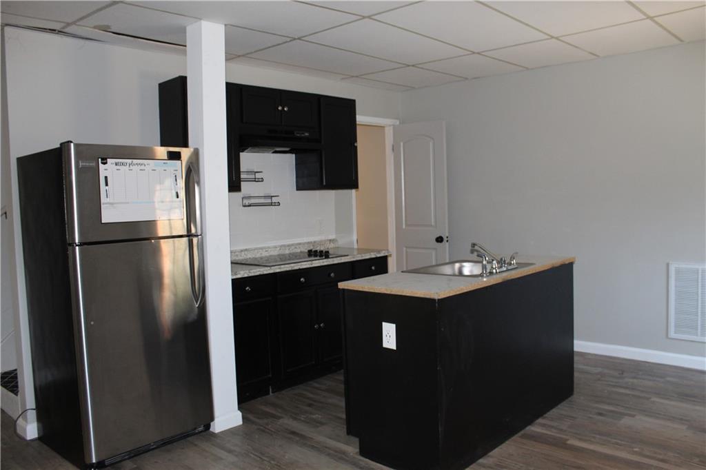40 Chestatee Springs Road Dahlonega, GA 30533 - Photo 20 of 43 a kitchen with stainless steel appliances granite countertop a refrigerator and a sink