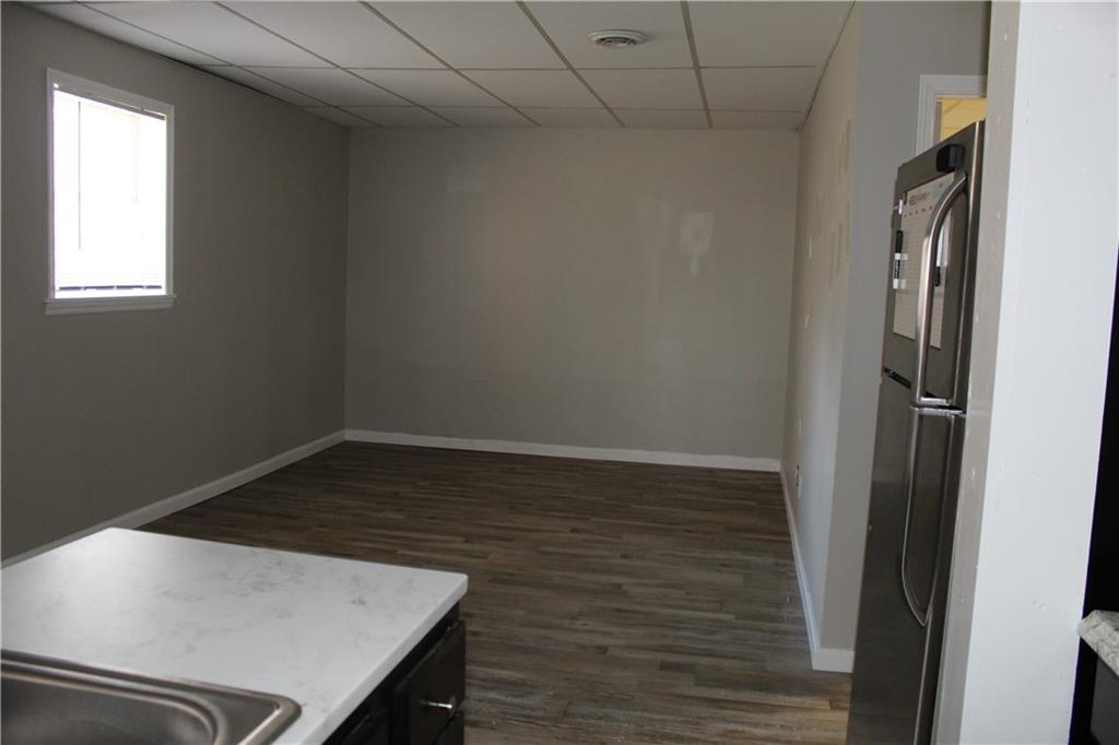 40 Chestatee Springs Road Dahlonega, GA 30533 - Photo 21 of 43 a view of wooden floor and cabinets in a room
