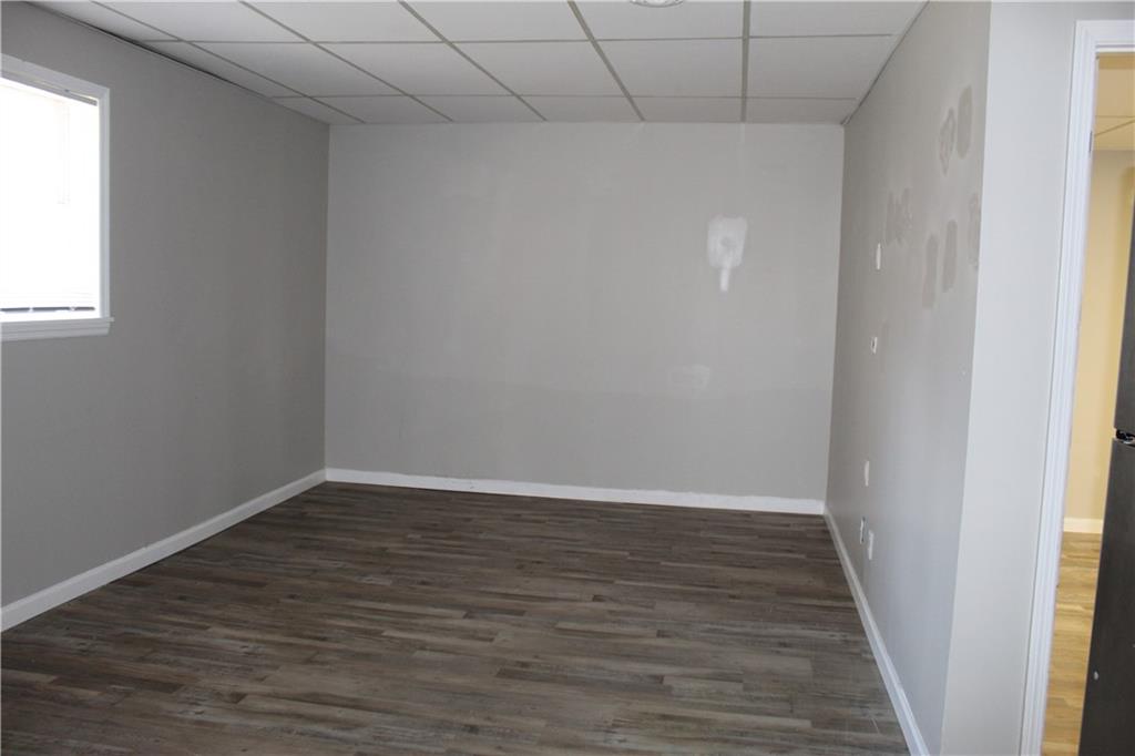40 Chestatee Springs Road Dahlonega, GA 30533 - Photo 22 of 43 a view of an empty room with wooden floor and a window