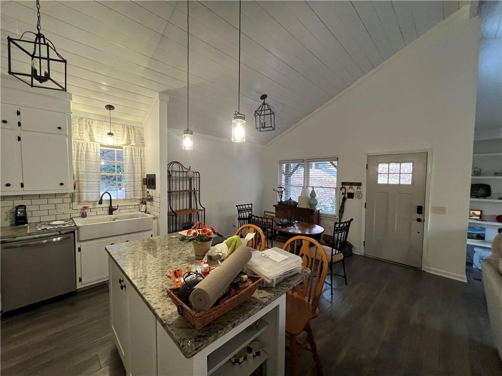 40 Chestatee Springs Road Dahlonega, GA 30533 - Photo 24 of 42 a view of a dining room with furniture and wooden floor