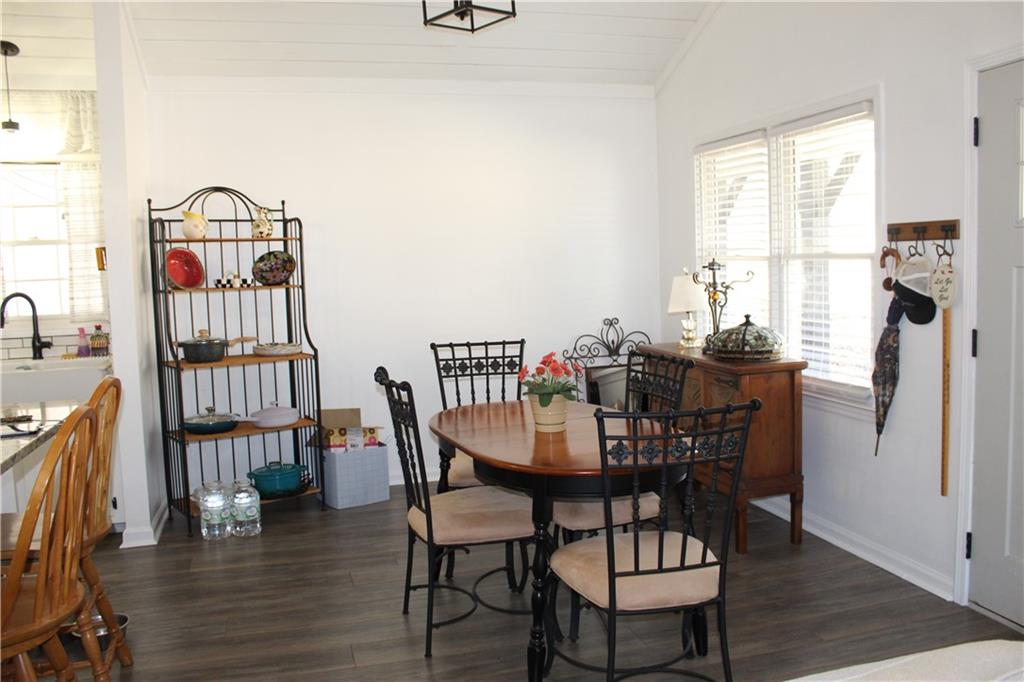 40 Chestatee Springs Road Dahlonega, GA 30533 - Photo 3 of 43 a view of a dining room with furniture and wooden floor