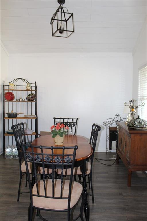 40 Chestatee Springs Road Dahlonega, GA 30533 - Photo 31 of 43 a dining room with furniture and wooden floor