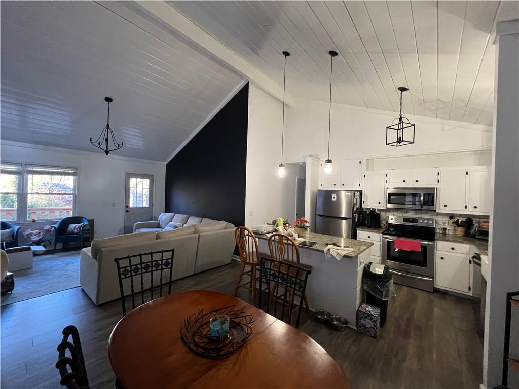 40 Chestatee Springs Road Dahlonega, GA 30533 - Photo 33 of 42 a living room with furniture and kitchen view