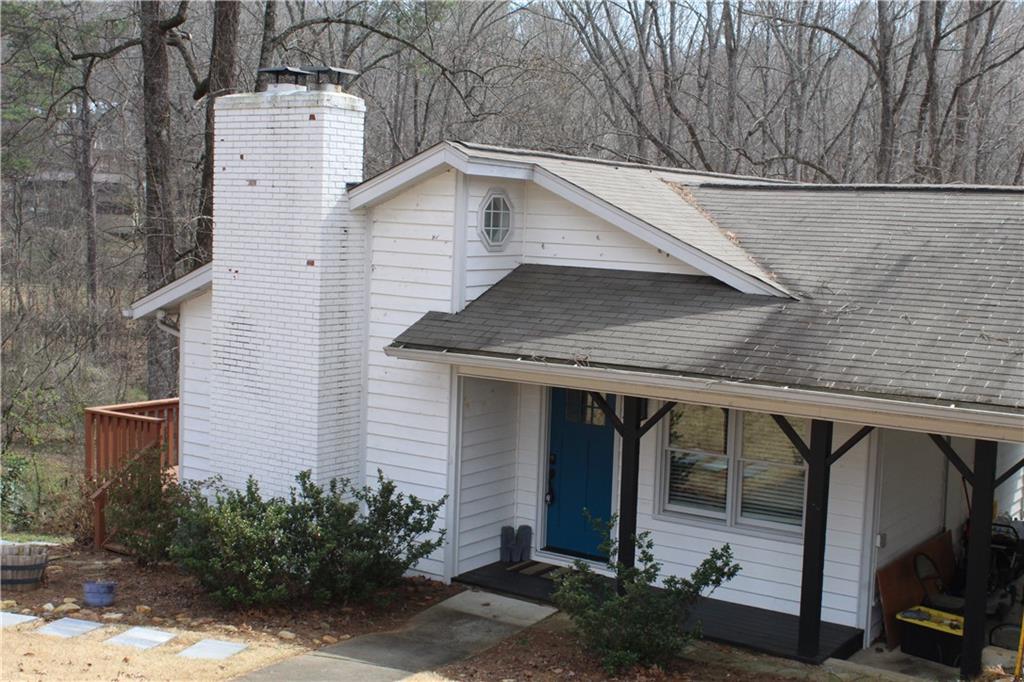 40 Chestatee Springs Road Dahlonega, GA 30533 - Photo 36 of 43 a view of a house with a garage