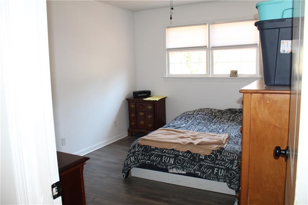 40 Chestatee Springs Road Dahlonega, GA 30533 - Photo 8 of 43 a bedroom with a bed and a window