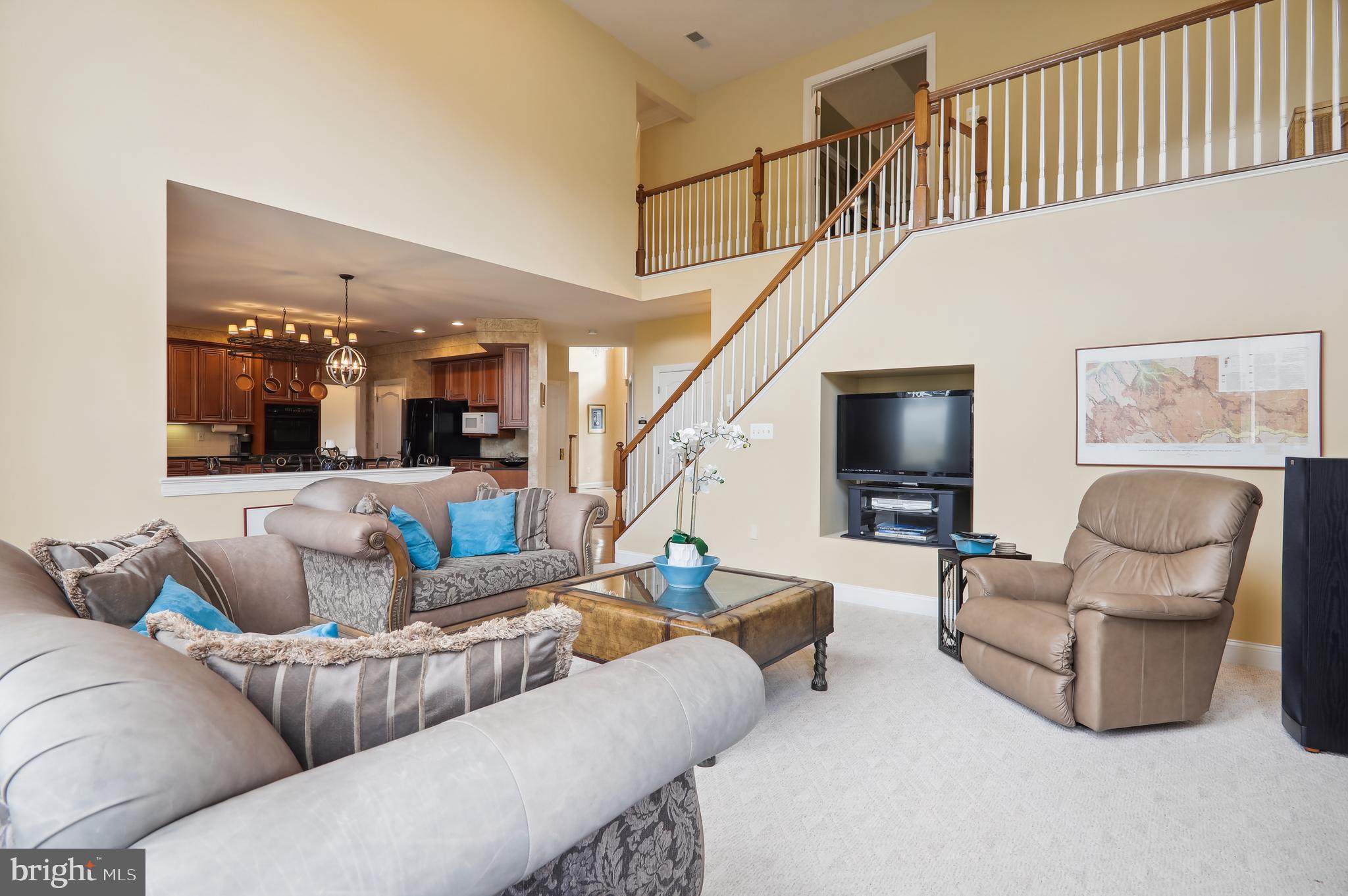 12101 Sheets Farm Road North Potomac, MD 20878 - Photo 24 of 105 Family Room leading to upper level