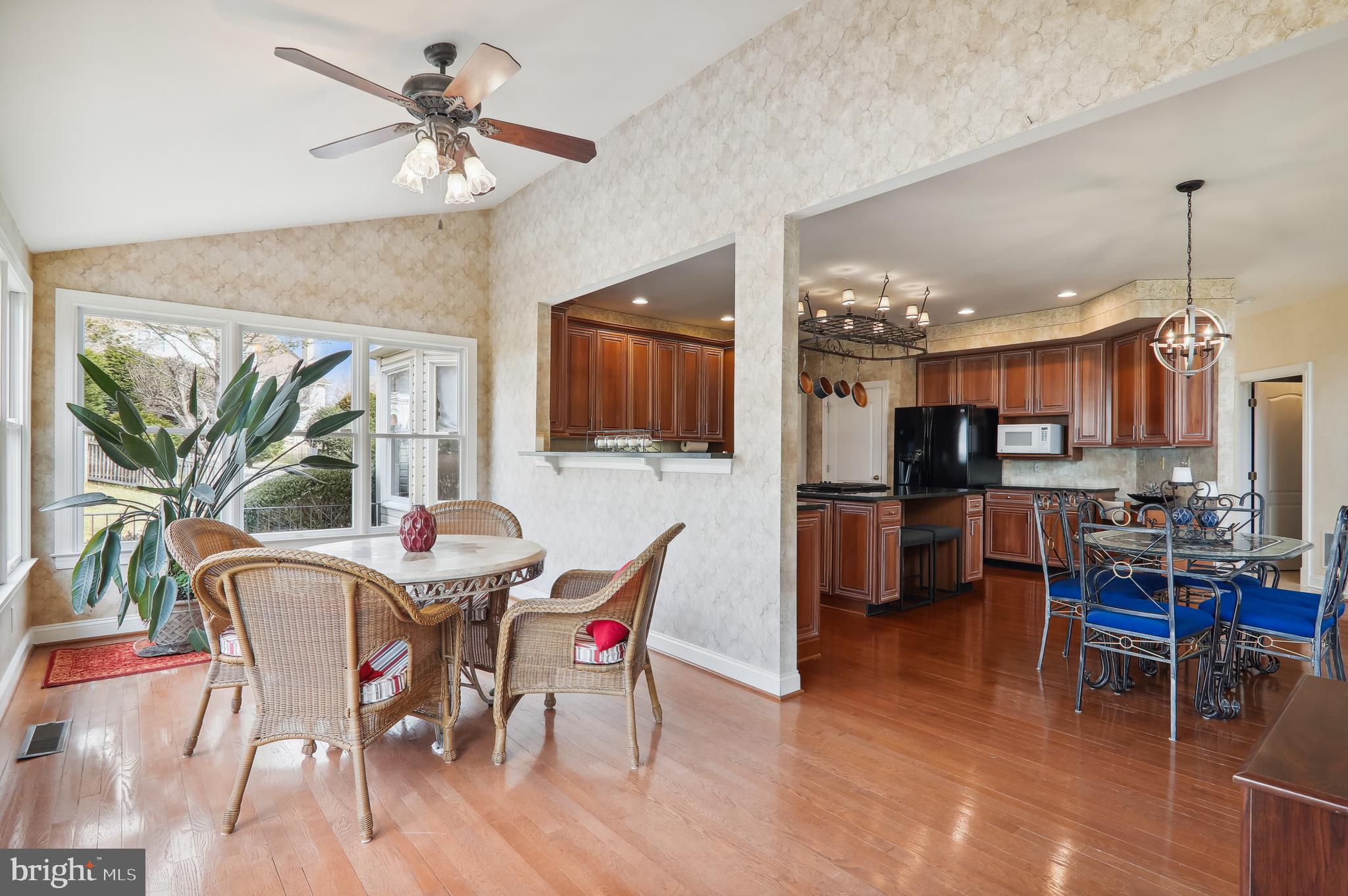12101 Sheets Farm Road North Potomac, MD 20878 - Photo 26 of 105 Sunroom open to the kitchen