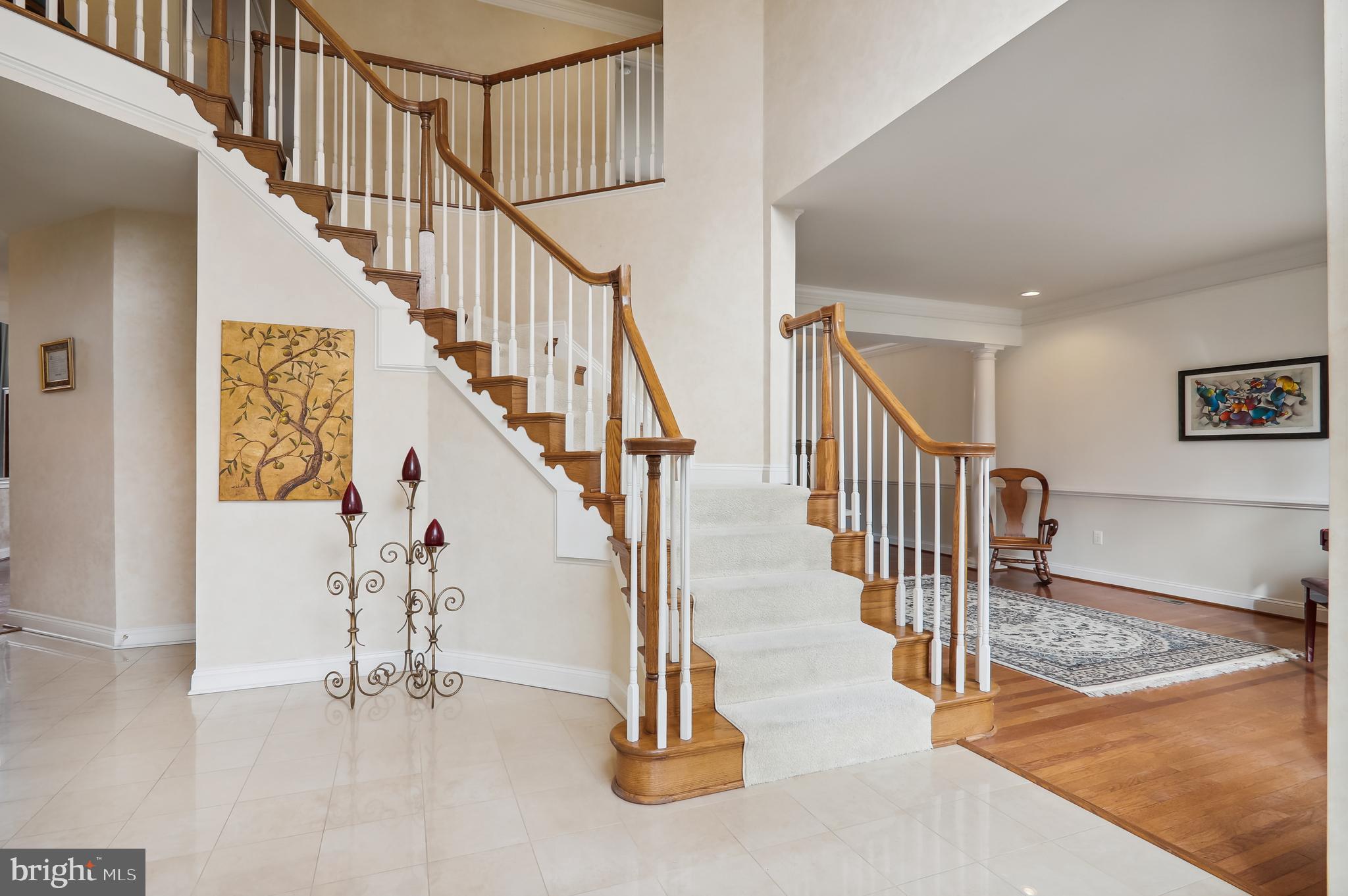 12101 Sheets Farm Road North Potomac, MD 20878 - Photo 4 of 105 Elegant foyer with dramatic chandelier