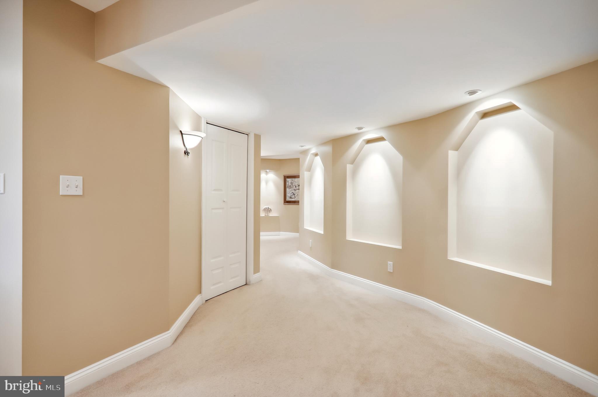 12101 Sheets Farm Road North Potomac, MD 20878 - Photo 57 of 105 Beautiful Lower level hall with with inset detail